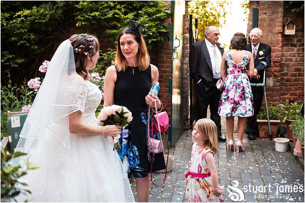 Candid photographs as the guests enjoy the drinks reception at Erasmus Darwin House in Lichfield by Lichfield Wedding Photographer Stuart James