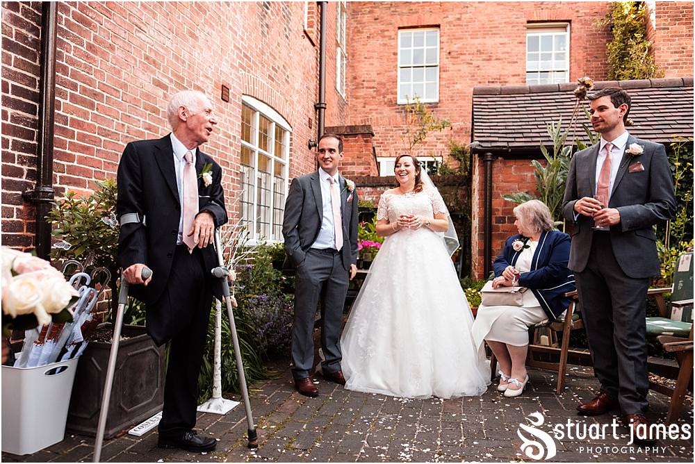 Documenting the wonderful Father of the Bride speech and guest reactions in the gardens of Erasmus Darwin House in Lichfield by Lichfield Wedding Photographer Stuart James