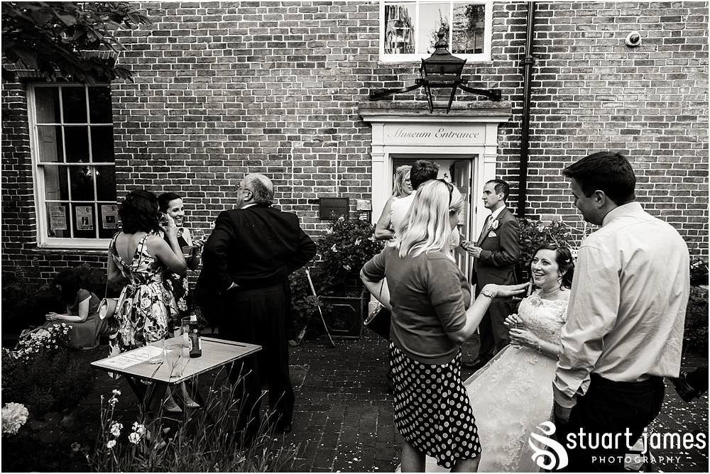 Candid photos capture the characters enjoying the fabulous wedding at Erasmus Darwin House in Lichfield by Lichfield Wedding Photographer Stuart James