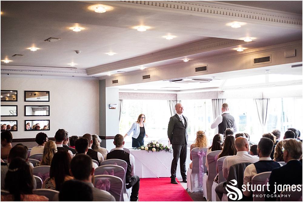 Storytelling photographs capturing the mood as the guests arrive at The Moat House in Acton Trussell by Documentary Wedding Photographer Stuart James