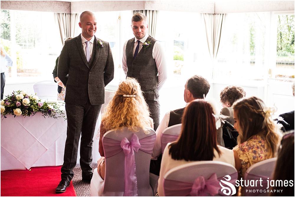 Storytelling photographs capturing the mood as the guests arrive at The Moat House in Acton Trussell by Documentary Wedding Photographer Stuart James