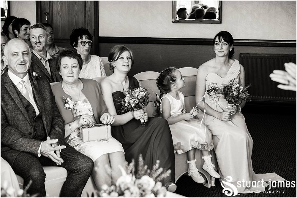 Emotional moment during the ceremony at The Moat House in Acton Trussell by Documentary Wedding Photographer Stuart James