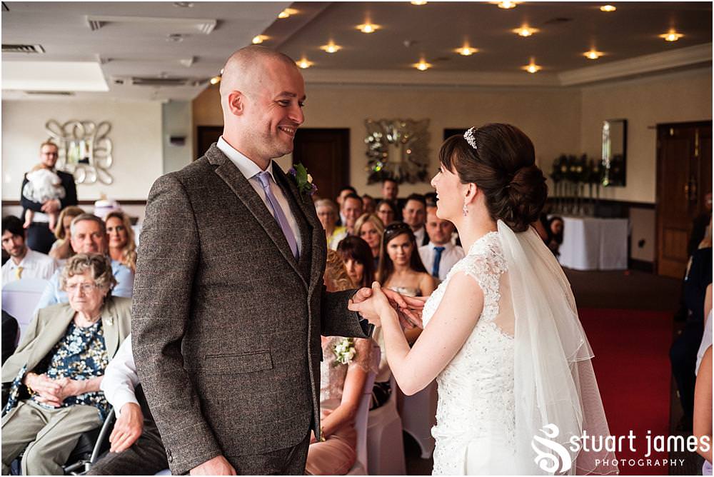 Capturing the story of the wedding ceremony at The Moat House in Acton Trussell by Documentary Wedding Photographer Stuart James