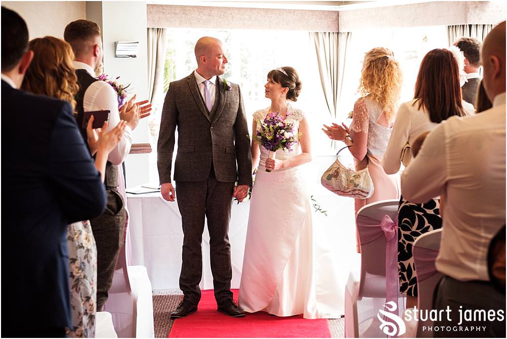 Capturing the story of the wedding ceremony at The Moat House in Acton Trussell by Documentary Wedding Photographer Stuart James
