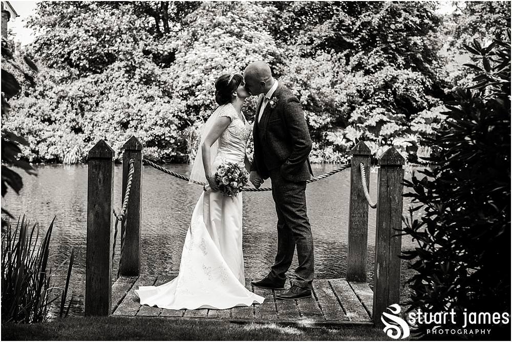 Creative relaxed portraits of the bride and groom around the beautiful grounds of The Moat House in Acton Trussell by Documentary Wedding Photographer Stuart James