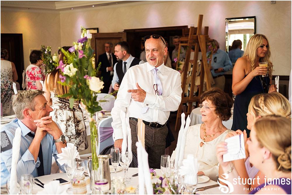 Reportage photographs of the guests enjoying the wedding breakfast at The Moat House in Acton Trussell by Documentary Wedding Photographer Stuart James