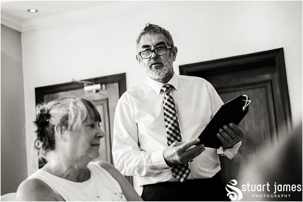 Storytelling photographs of the wedding speeches at The Moat House in Acton Trussell by Documentary Wedding Photographer Stuart James