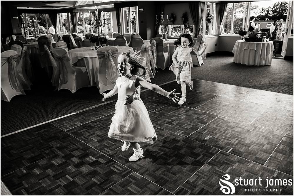 Fun photos showing the life and style of the party at The Moat House in Acton Trussell by Documentary Wedding Photographer Stuart James