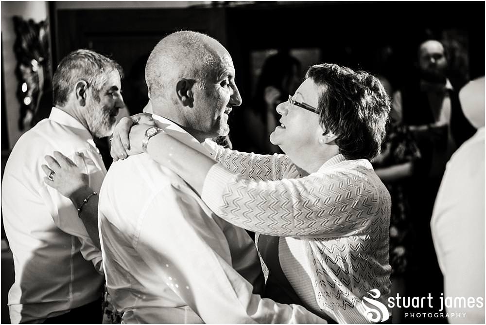 Photos of the fabulous evening reception at The Moat House in Acton Trussell by Documentary Wedding Photographer Stuart James