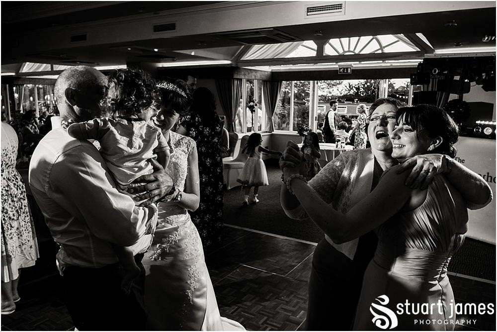 Photos of the fabulous evening reception at The Moat House in Acton Trussell by Documentary Wedding Photographer Stuart James