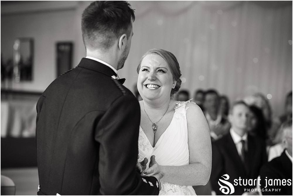 Unobtrusive photographs of the wedding ceremony capturing the story of the day at The Moat House in Stafford by Documentary Wedding Photographer Stuart James