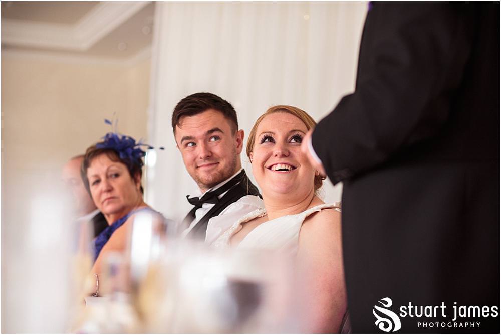Capturing the speech and the wonderful reactions as the father of the bride opens his heart at The Moat House in Stafford by Documentary Wedding Photographer Stuart James