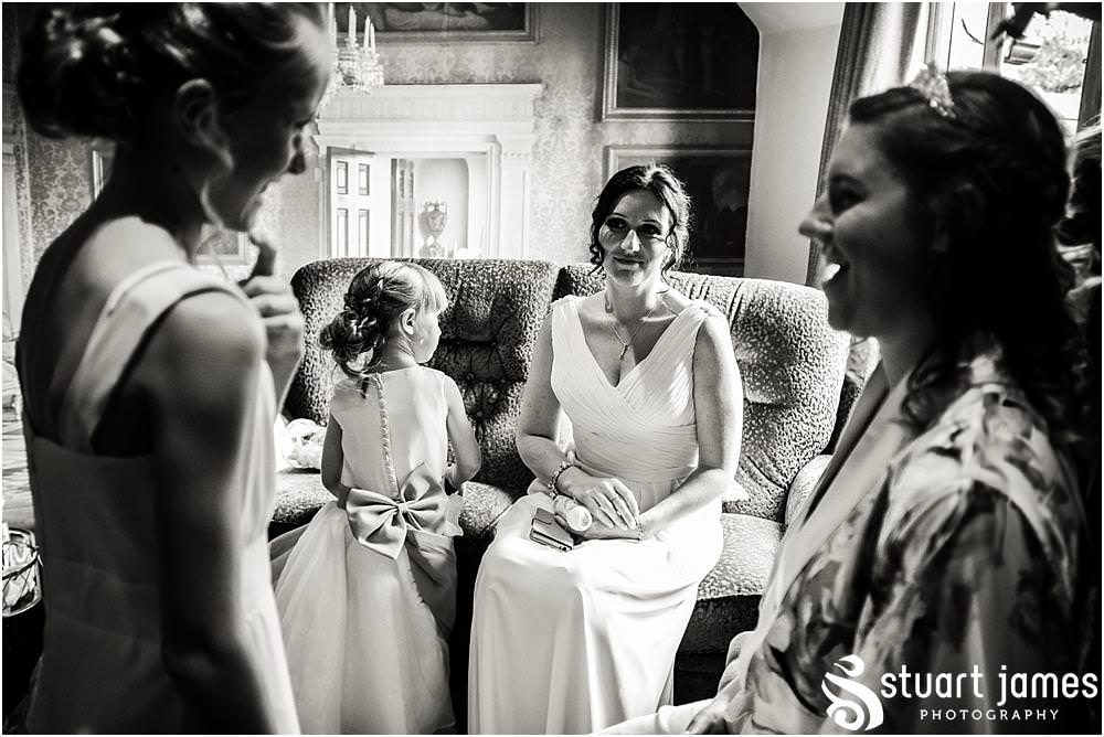 Unobtrusive storytelling photographs of the bridal hair and makeup at The Moat House in Acton Trussell by Penkridge Wedding Photographer Stuart James