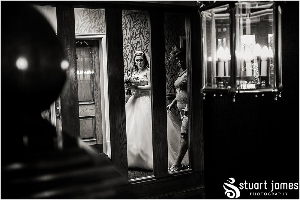 Capturing the emotion and the mood during the final preparations at The Moat House in Acton Trussell by Penkridge Wedding Photographer Stuart James