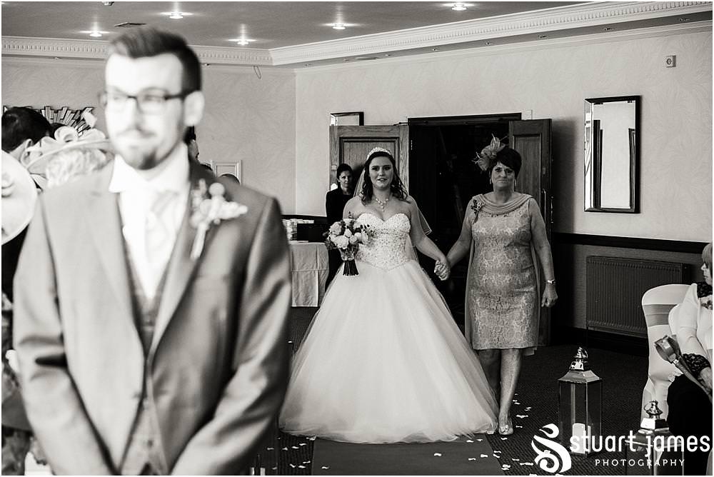 Capturing the beautiful entrance of the bride at The Moat House in Acton Trussell by Penkridge Wedding Photographer Stuart James