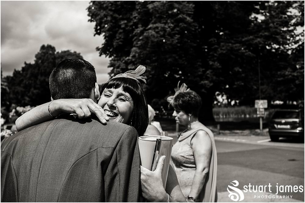 Candid photos as the guests enjoy the drinks reception at The Moat House in Acton Trussell captured by Penkridge Wedding Photographer Stuart James
