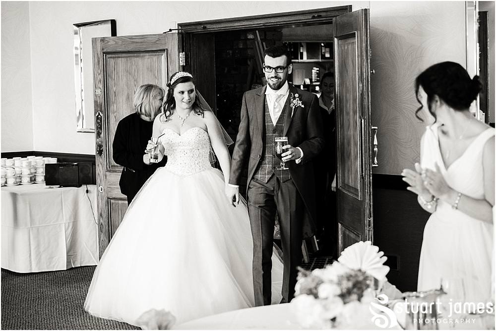 Entrance of the bride and groom at The Moat House in Acton Trussell captured by Penkridge Wedding Photographer Stuart James