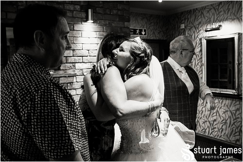 Excitement as the evening guests greet the bride and groom at The Moat House in Acton Trussell captured by Penkridge Wedding Photographer Stuart James