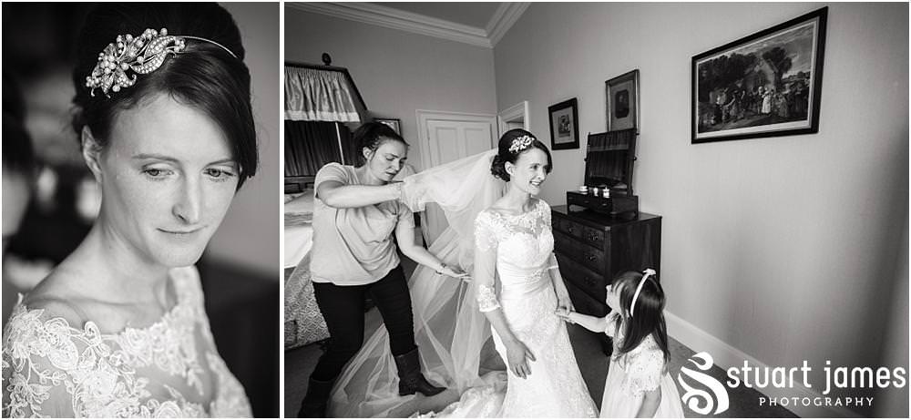 Creative candid photographs of the bridal preparations at Sandon Hall in Staffordshire by Documentary Wedding Photographer Stuart James