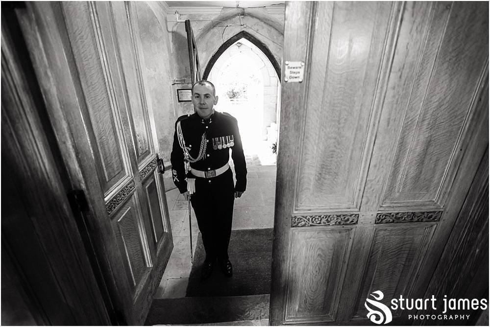 Documenting the arrival of the guests for the wedding at All Saints Church in Sandon by Documentary Wedding Photographer Stuart James