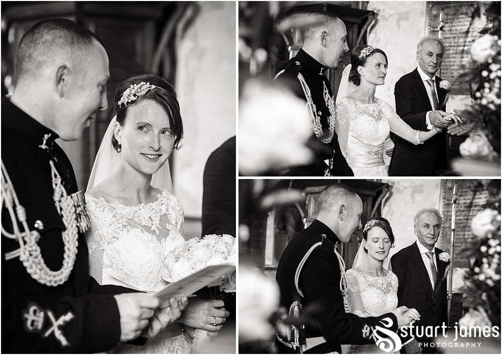 Storytelling wedding photography as the bride arrives to her waiting groom at All Saints Church in Sandon by Documentary Wedding Photographer Stuart James