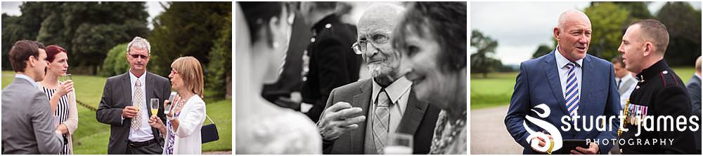 Candid photographs of the guests enjoying the drinks reception at Sandon in Staffordshire by Documentary Wedding Photographer Stuart James