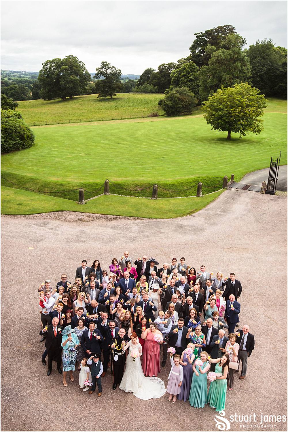 Wedding group photograph at Sandon in Staffordshire by Documentary Wedding Photographer Stuart James