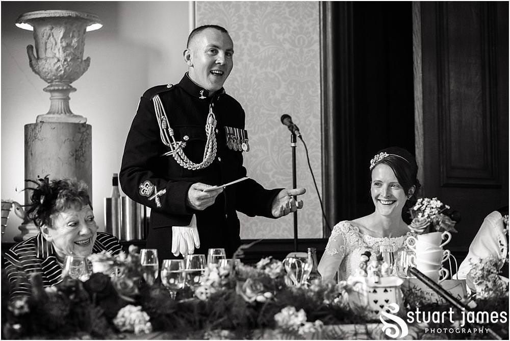 Creative wedding photographs of the Grooms speech and wonderful guest reactions at Sandon in Staffordshire by Documentary Wedding Photographer Stuart James