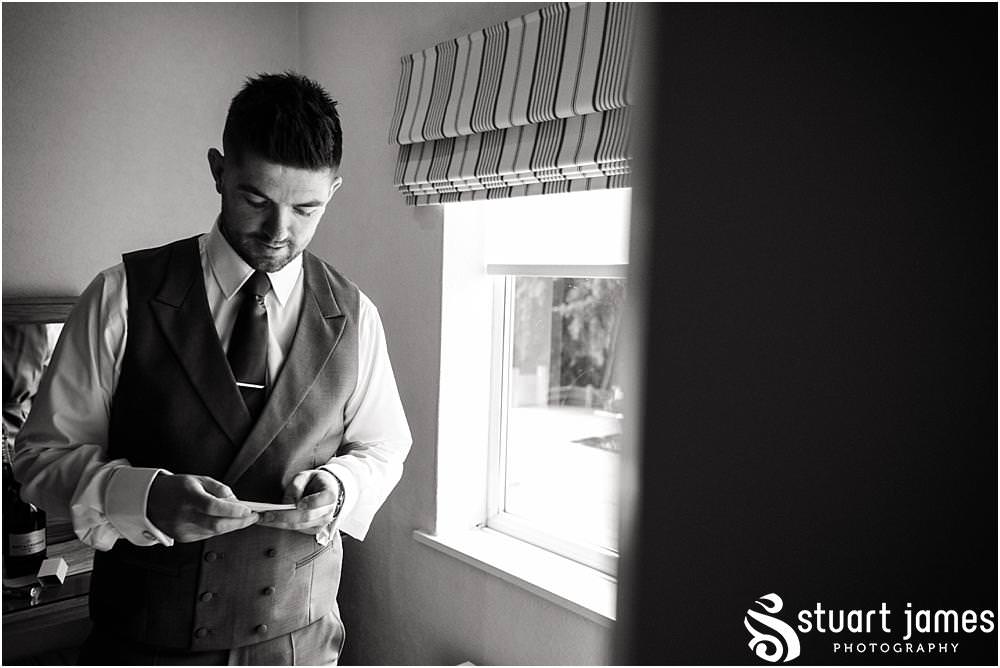 Reportage photographs of the groomsmen preparations before the wedding at Warwick House in Southam by Documentary Wedding Photographer Stuart James
