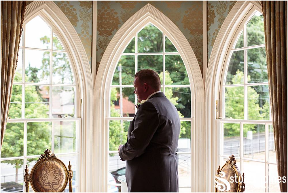 Candid photographs of the groomsmen having a final toast to the day at Warwick House in Southam by Documentary Wedding Photographer Stuart James