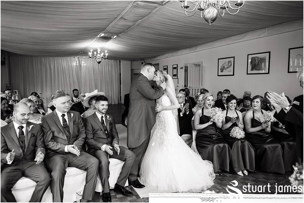 Beautiful photographs of the wedding ceremony at Warwick House in Southam by Documentary Wedding Photographer Stuart James