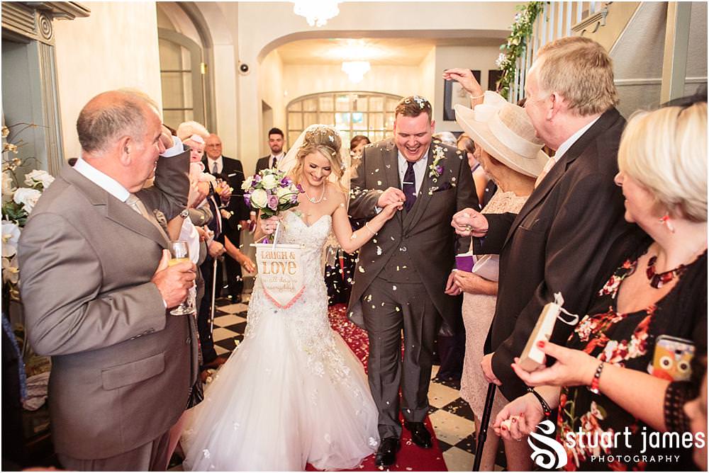 Confetti fun at Warwick House in Southam by Documentary Wedding Photographer Stuart James