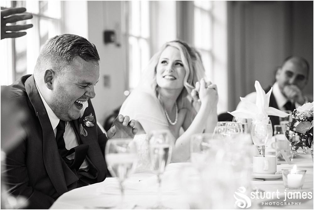 Documenting the best mans speech and fabulous guest reactions at Warwick House in Southam by Documentary Wedding Photographer Stuart James