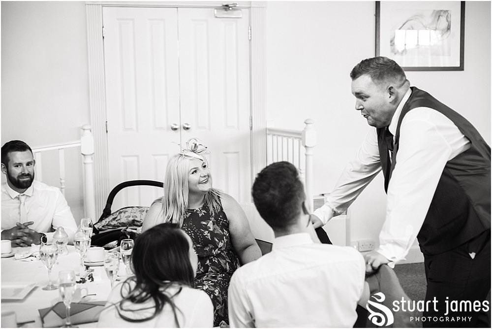Candid photographs of the guests enjoying the evening reception at the beautiful Warwick House in Southam by Documentary Wedding Photographer Stuart James