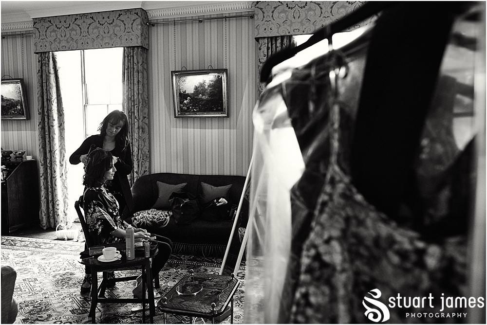 Capturing the wedding morning preparations of the bridal party at Weston Park in Staffordshire by Documentary Wedding Photographer Stuart James