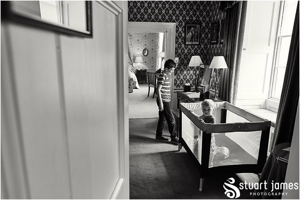 Candid photographs of the grooms children before the ceremony at Weston Park in Staffordshire by Documentary Wedding Photographer Stuart James