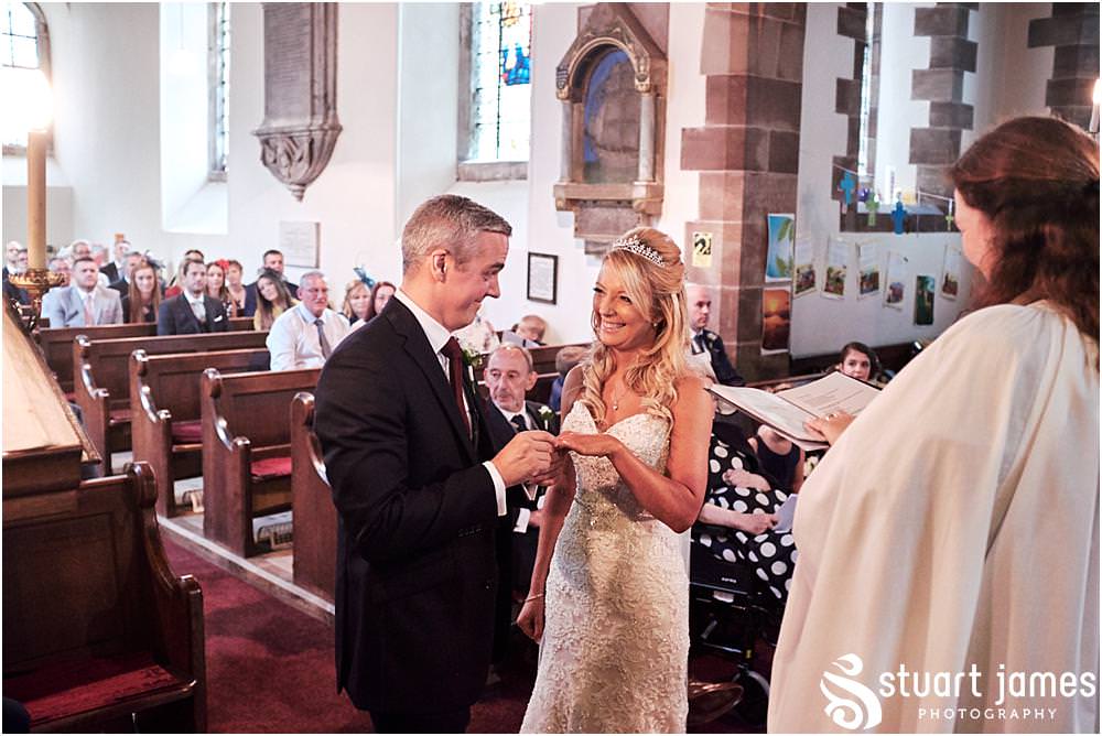 Unobtrusive photographs of the wedding ceremony at St Andrews Church in Weston Park, Staffordshire by Documentary Wedding Photographer Stuart James