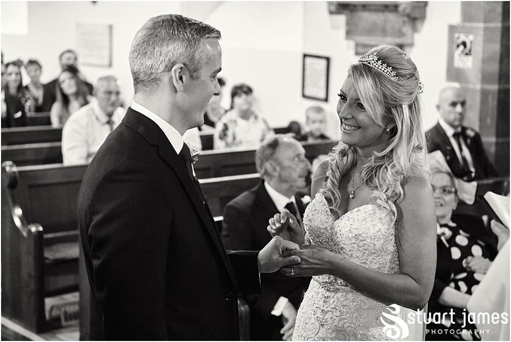 Unobtrusive photographs of the wedding ceremony at St Andrews Church in Weston Park, Staffordshire by Documentary Wedding Photographer Stuart James