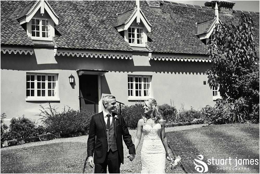 Relaxed creative photographs as the bride and groom lead the guests to the reception at Weston Park in Staffordshire by Documentary Wedding Photographer Stuart James