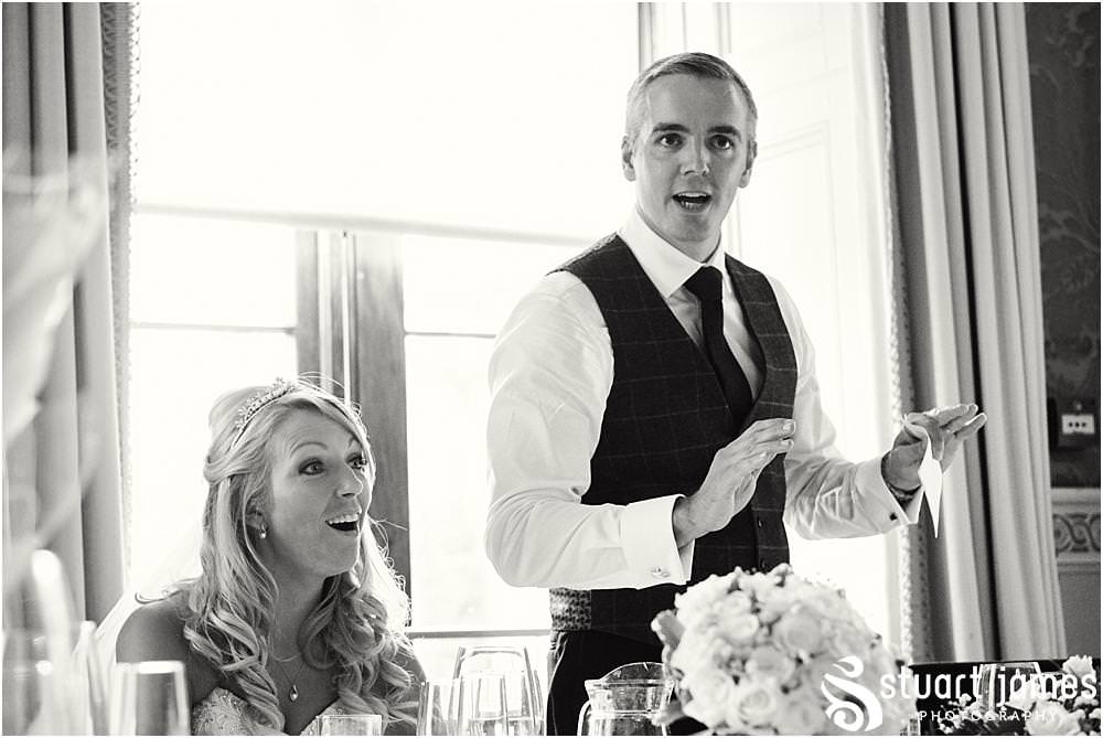 Creative photographs capturing the mood and reaction to the grooms speech at Weston Park in Staffordshire by Documentary Wedding Photographer Stuart James