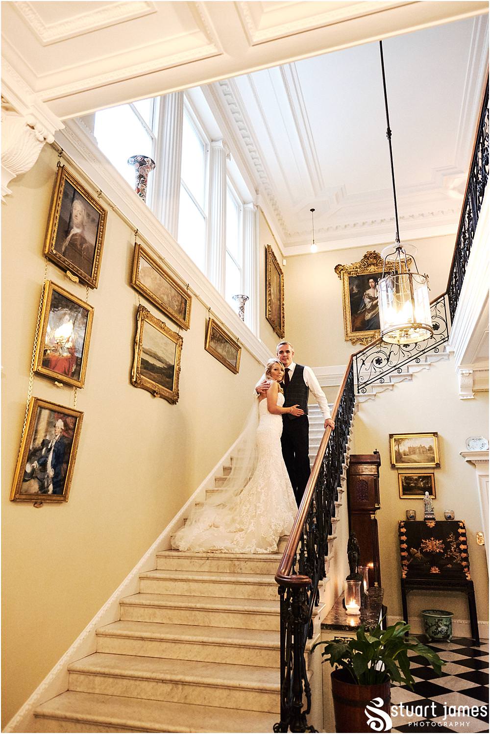 Creative portraits on the grand staircase at Weston Park in Staffordshire by Documentary Wedding Photographer Stuart James