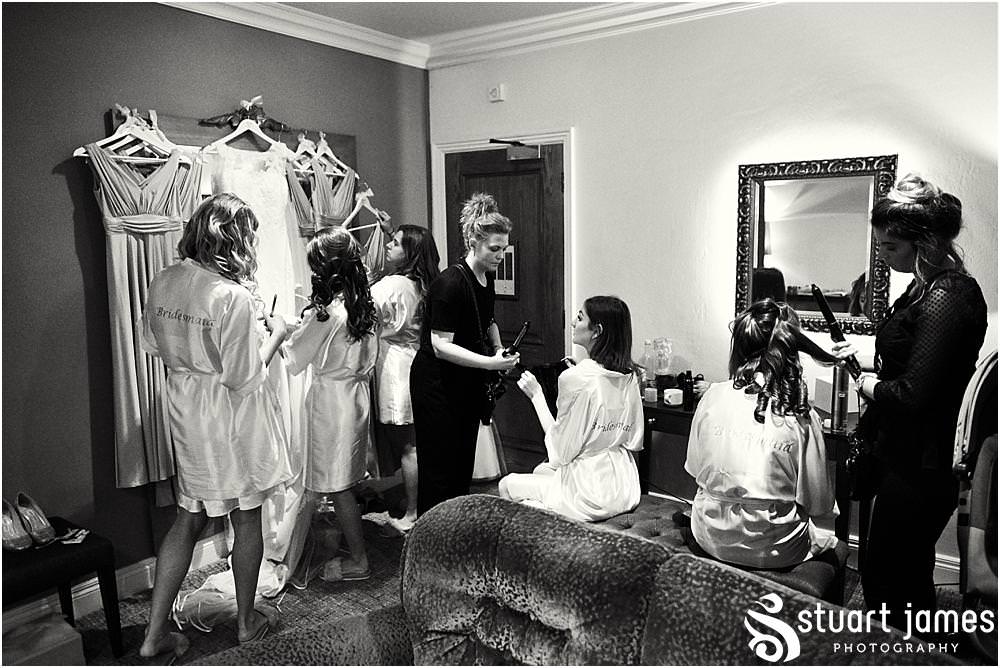 Documenting the wedding morning with the bridal prep at The Moat House in Acton Trussell by Documentary Wedding Photographer Stuart James