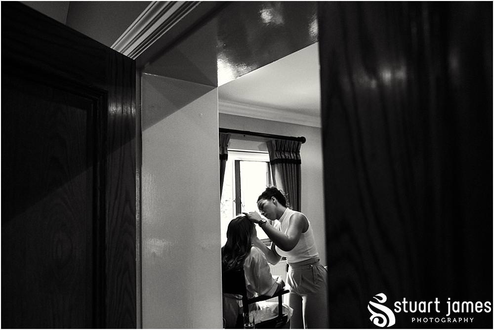 Documenting the wedding morning with the bridal prep at The Moat House in Acton Trussell by Documentary Wedding Photographer Stuart James