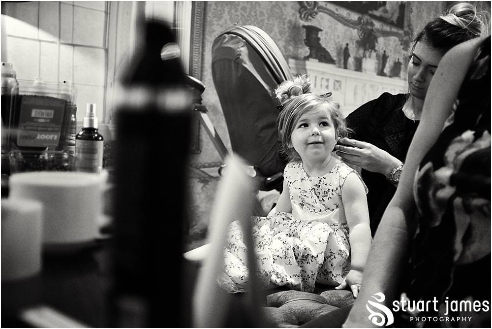 Candid photographs of the bridal party preparations with Francesco Group hair at The Moat House in Acton Trussell by Documentary Wedding Photographer Stuart James