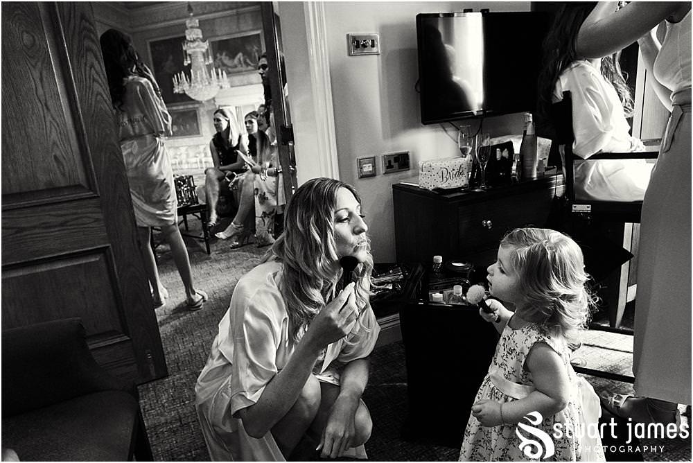 Candid photographs of the bridal party preparations with Francesco Group hair at The Moat House in Acton Trussell by Documentary Wedding Photographer Stuart James