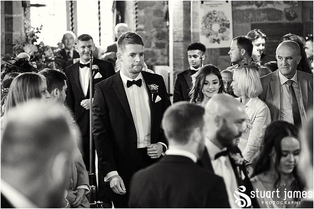 Capturing the beautiful bridal procession down the aisle at St James Church in Acton Trussell by Documentary Wedding Photographer Stuart James