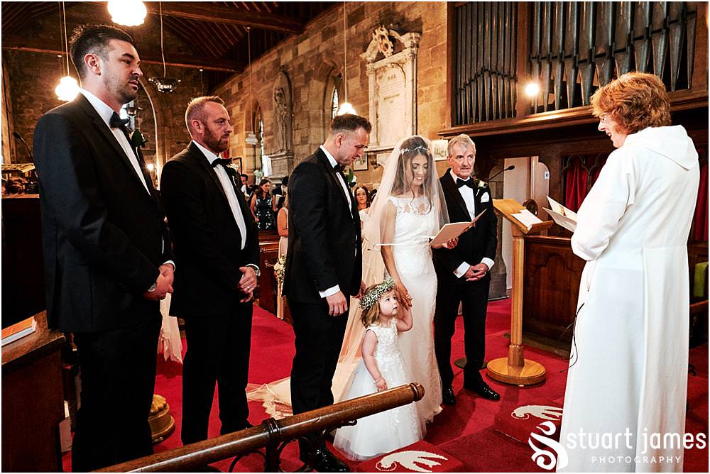 Capturing the beautiful bridal procession down the aisle at St James Church in Acton Trussell by Documentary Wedding Photographer Stuart James