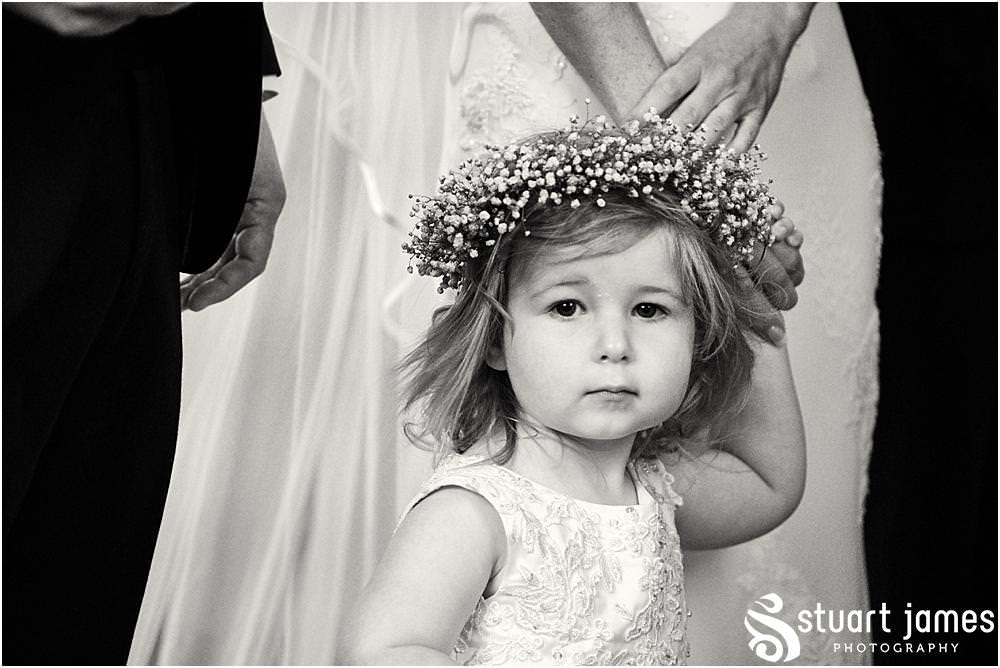 Unobtrusive silent photographs capturing each and every moment of the beautiful wedding ceremony at St James Church in Acton Trussell by Documentary Wedding Photographer Stuart James