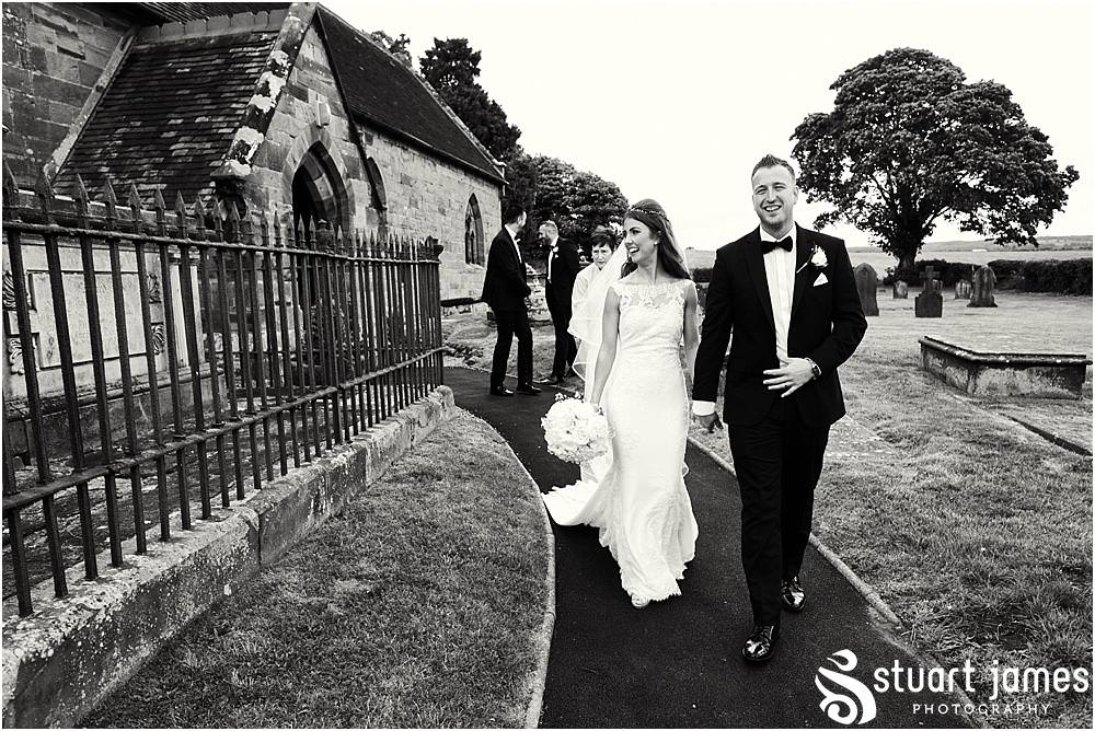 A stunning departure for the bride and groom with Platinum Cars at St James Church in Acton Trussell by Documentary Wedding Photographer Stuart James