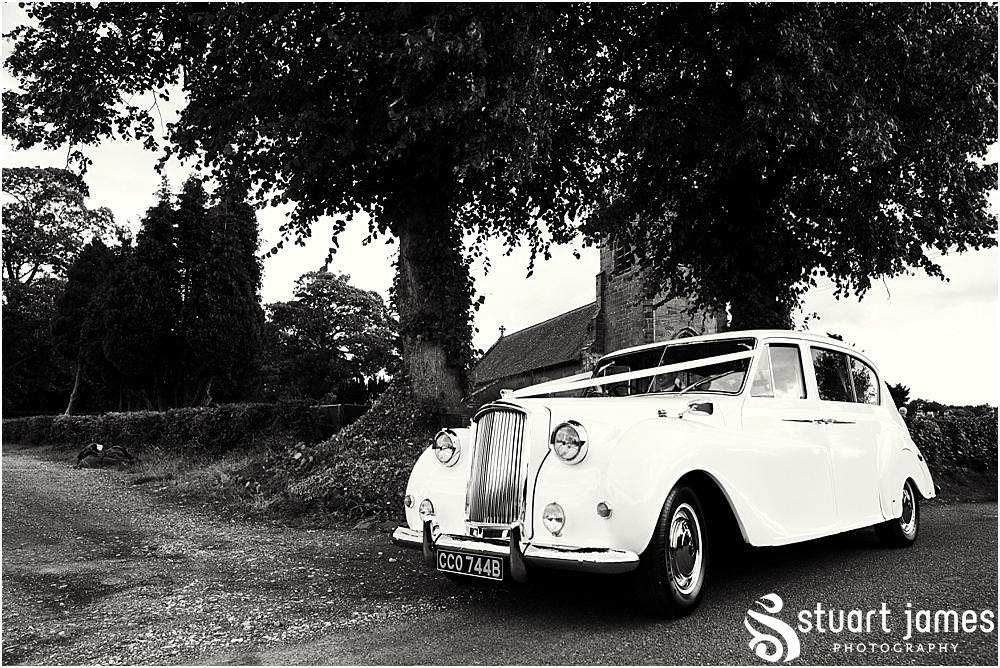 A stunning departure for the bride and groom with Platinum Cars at St James Church in Acton Trussell by Documentary Wedding Photographer Stuart James